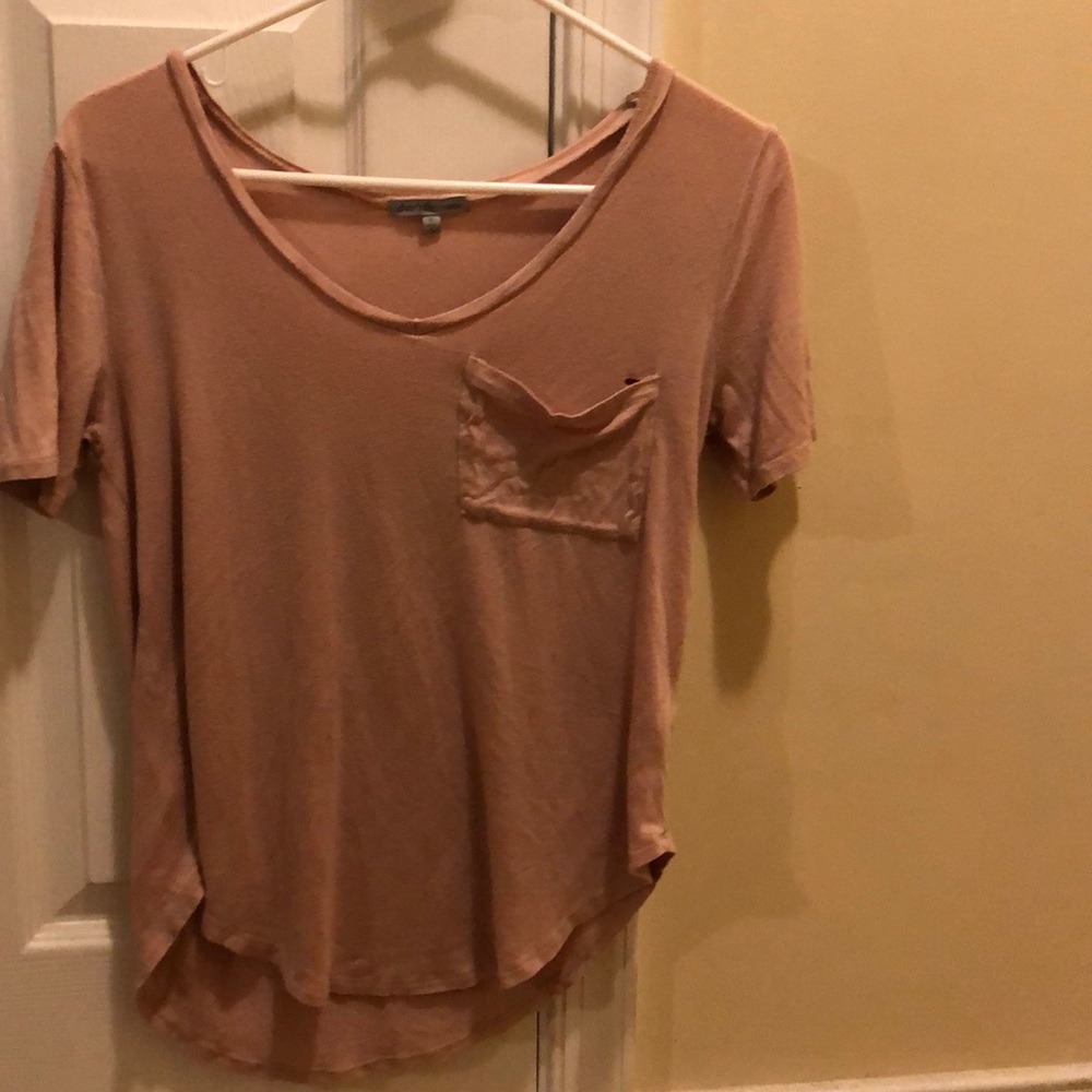 A pink v-neck t-shirt